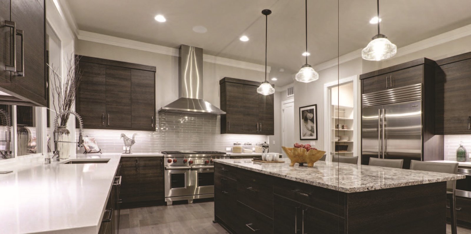 Well-equipped modular kitchen with sleek cabinets and modern appliances at Sunteck Sky Park Mira Road.