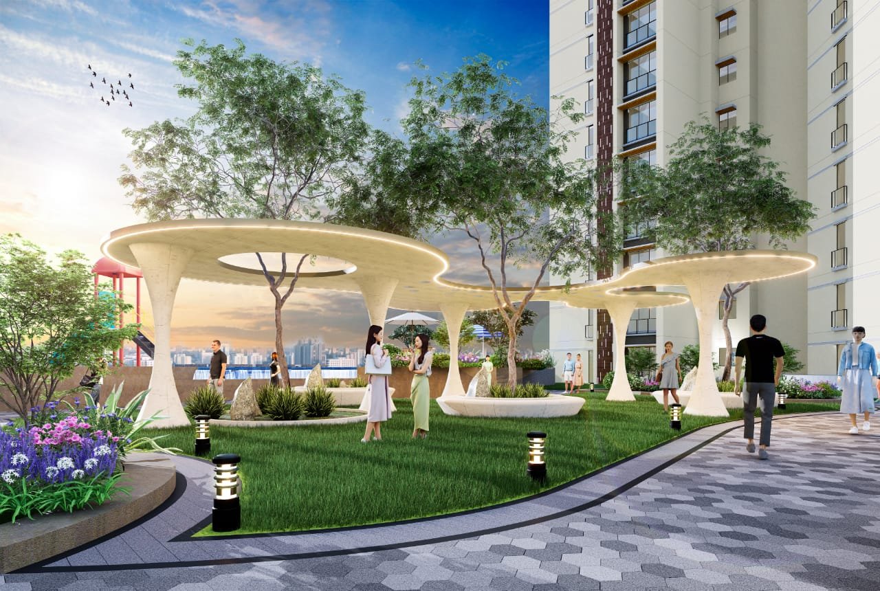 Peaceful landscaped walking path surrounded by greenery at Sunteck Sky Park Mira Road.