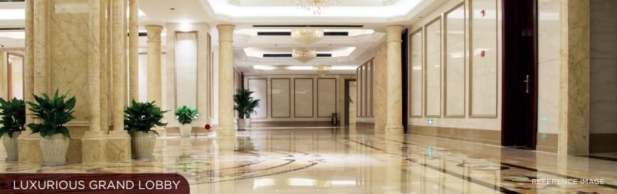 Luxurious grand lobby of Sunteck Sky Park in Mira Road featuring elegant marble interiors and modern lighting.
